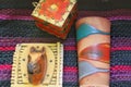 An unusual assortment?Ã¢âÂª bookend jewelry box terracotta vase on a morracan rug